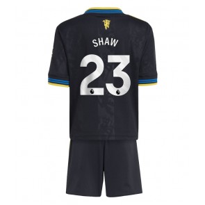 Manchester United Luke Shaw #23 Replika Tredje Tröja Barn 2025-26 Kortärmad (+ Korta byxor)